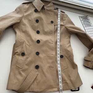 BB mid length trench coat NWT. Authenticity cannot be verified.